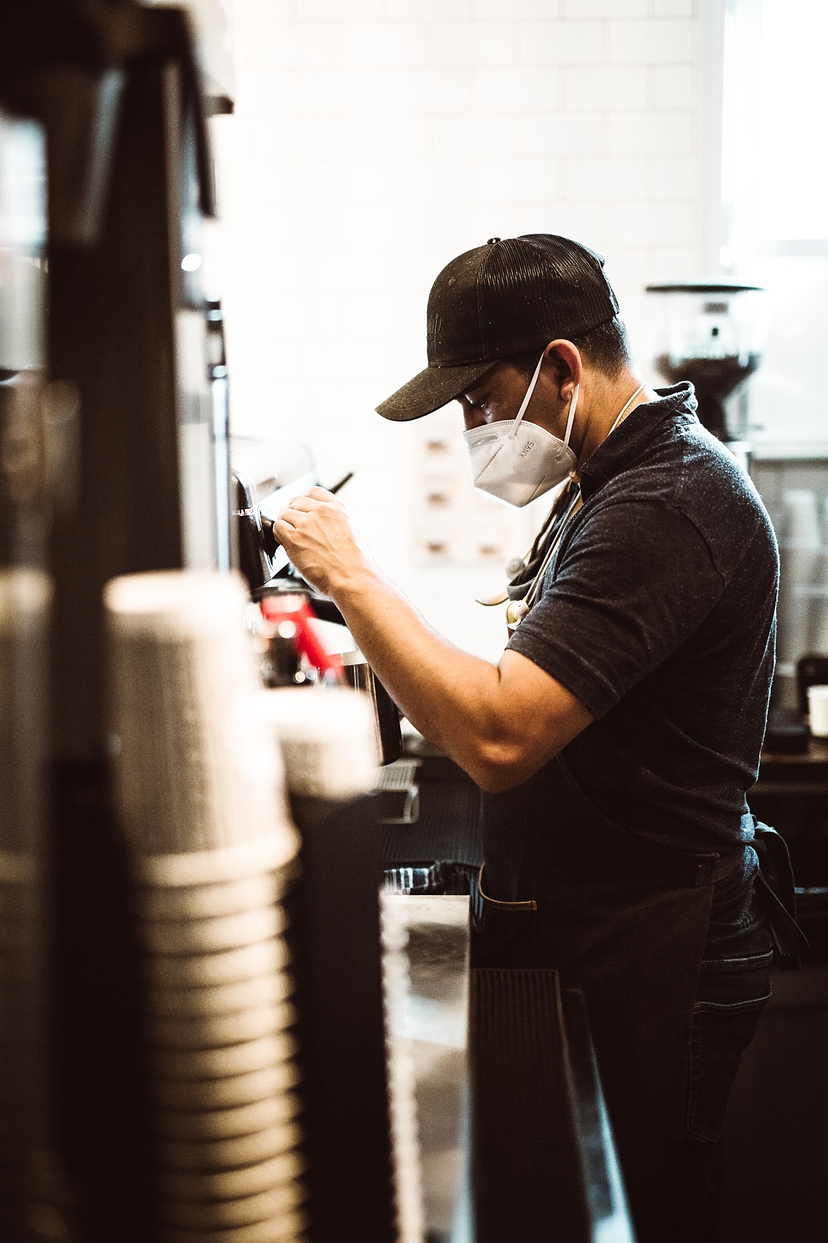 juan salazar serves coffee at la coop coffee