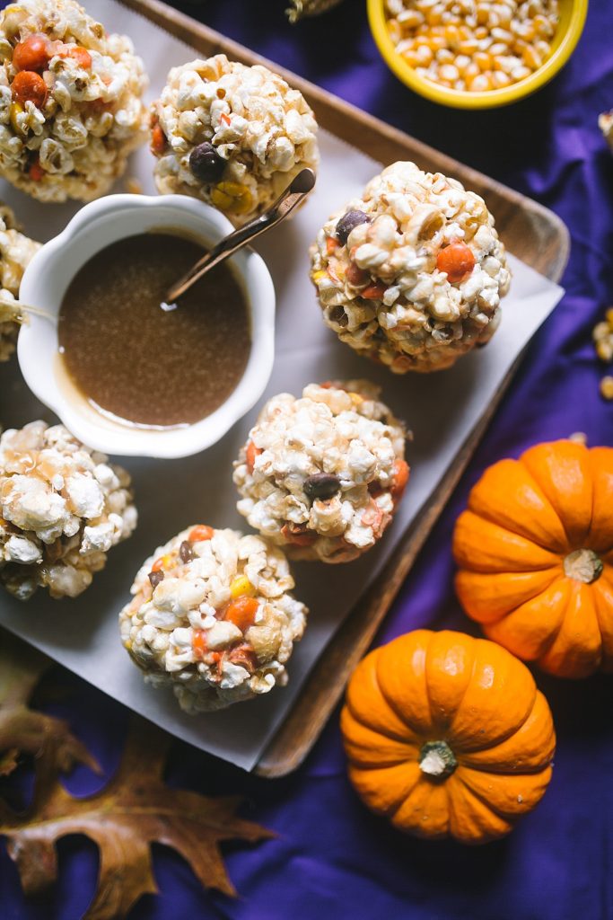 4 caramel balls with caramel and mini pumpkins