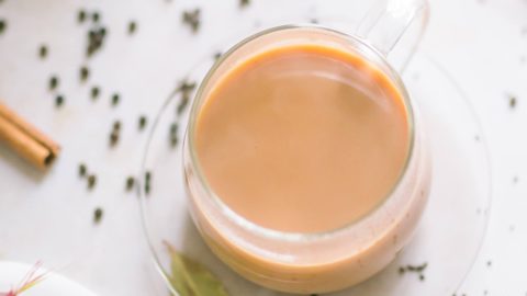 overhead shot of milky masala tea made from homemade chai masala powder