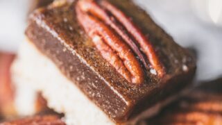 Square image of a pecan date molasses bar