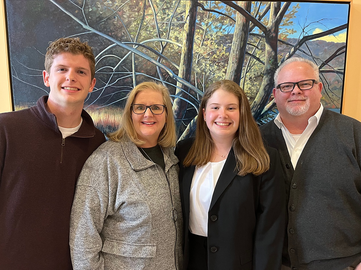 Family photo of William, Lisa, Isabel, and Robert Stewart