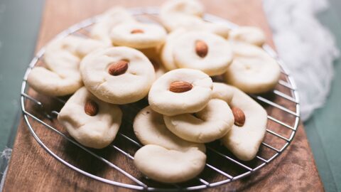 wide shot of soft buttery graybeh in 4 shapes piled high on cooking rack