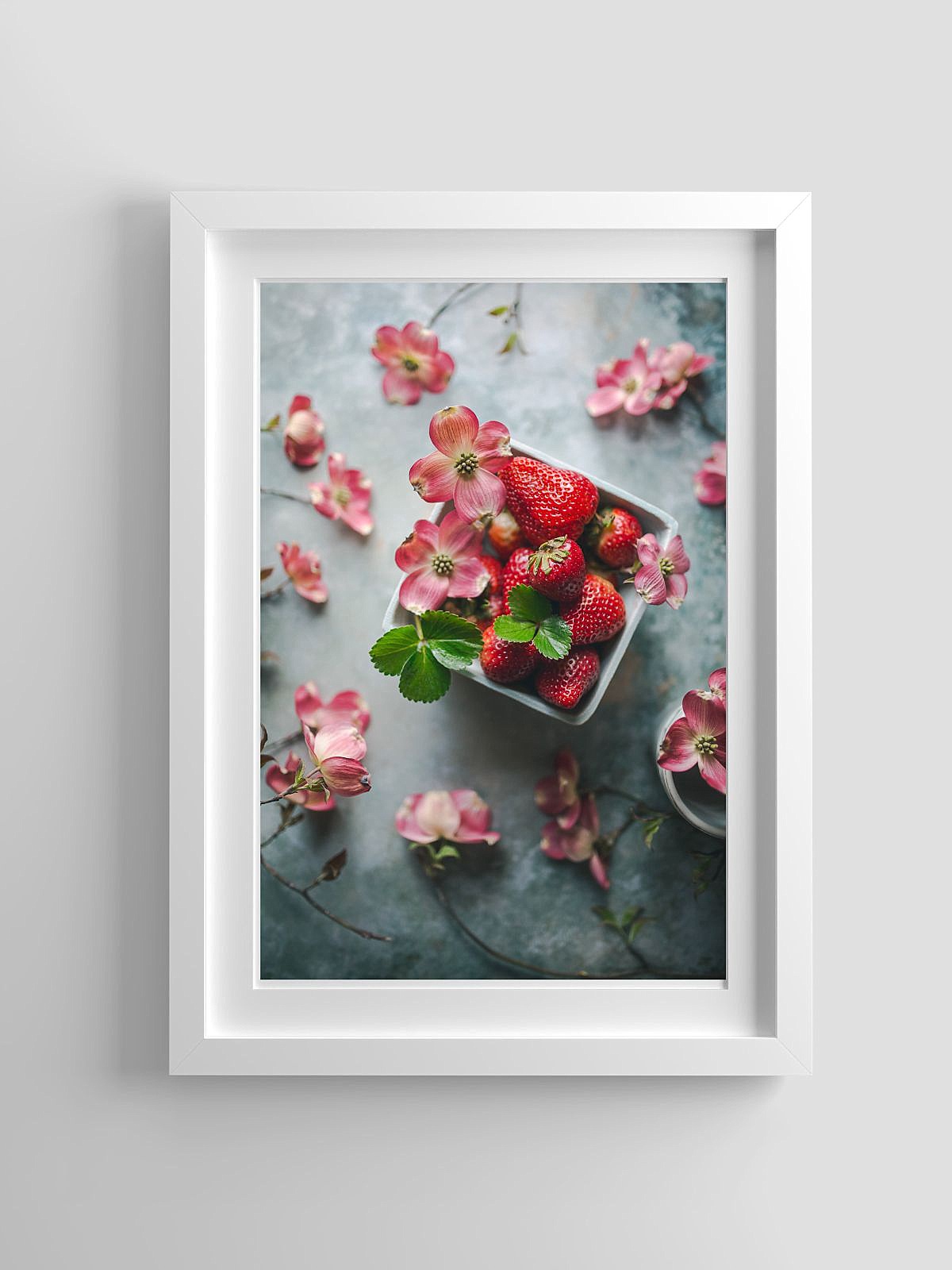 framed image of wall art for red kitchen featuring strawberries and pink dogwoods