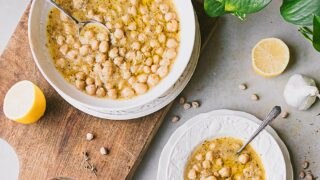 Square image of two bowls of Greek Chickpea soup